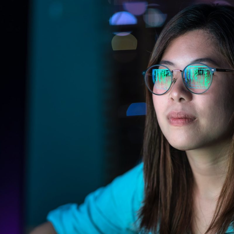 closeup-asian-businesswoman-working-hard-and-looking-the-digital-graphic-on-the-table.jpg